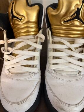 Jordan Women’s White and Gold High-Top Basketball Sneakers
